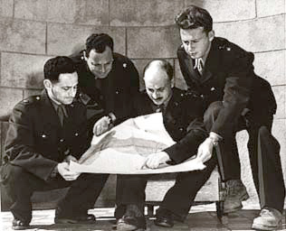 The Israeli delegation to the 1949 Armistice Agreements talks. Left to right: Commanders Yehoshafat Harkabi, Aryeh Simon, Yigael Yadin, and Yitzhak Rabin (1949)