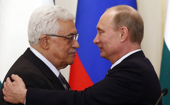 ussia's President Vladimir Putin (right) embraces his Palestinian counterpart Mahmoud Abbas after talks at the Novo-Ogaryovo state residence outside Moscow on March 14. Photo by REUTERS/Grigory Dukor