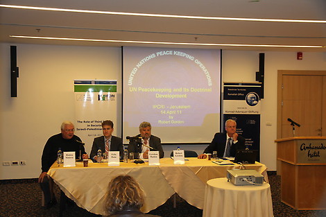 Hanna Siniora (co-director of IPCRI), Felix Dane (head of the Konrad-Adenauer-Stiftung in the Palestinian Territories), Gershon Baskin (co-director of IPCRI) and Major General (ret.) Robert Gordon (senior adviser to the United Nations Department of Peacekeeping Operations (UNDPKO) speaking about the role of third parties in securing Israeli-Palestinian peace.