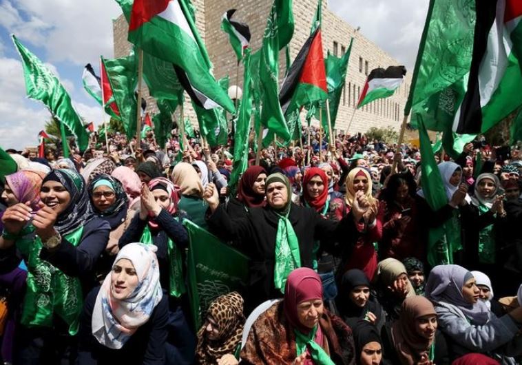 Palestinians supporting Hamas chant slogans during a rally celebrating Hamas student supporters winning the student council election at Birzeit University in Ramallah. (photo credit:REUTERS)