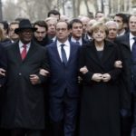 French President Francois Hollande (3rd from left) is surrounded by heads of state (from left to right) Prime Minister Benjamin Netanyahu, Ibrahim Boubakar Keita of Mali, Chancellor Angela Merkel of Germany, EU Council President Donald Tusk and Palestinian Authority President Mahmoud Abbas as they attend the solidarity march (March Republicaine) in the streets of Paris, January 11, 2015. (photo credit: AFP/Philippe Wojazer, Pool)