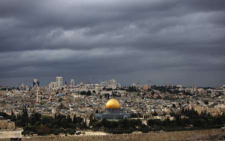 Rain clouds are seen over the Dome of the Rock, on the compound known to Muslims as al-Haram al-Sharif, and to Jews as Temple Mount, in Jerusalem's Old City October 30, 2009. REUTERS/Darren Whiteside