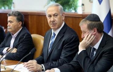 Prime Minister Binyamin Netanyahu speaks to the cabinet, April 6, 2014. Photo: AMIT SHABAY/POOL