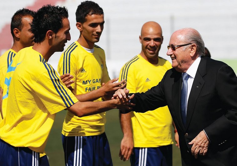 FIFA President Sepp Blatter with Palestinian soccer coaches. (photo credit:REUTERS)