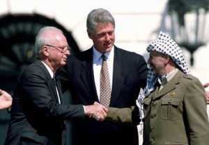 Former prime minister Yitzhak Rabin, former US president Bill Clinton, and the late PLO leader Yasser Arafat on the White House lawn.. (photo credit:REUTERS)