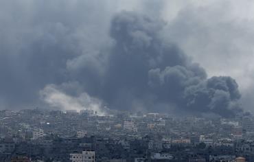 Smoke rises during what witnesses said were heavy Israeli shelling at the Shejaia neighbourhood in Gaza City Photo: REUTERS